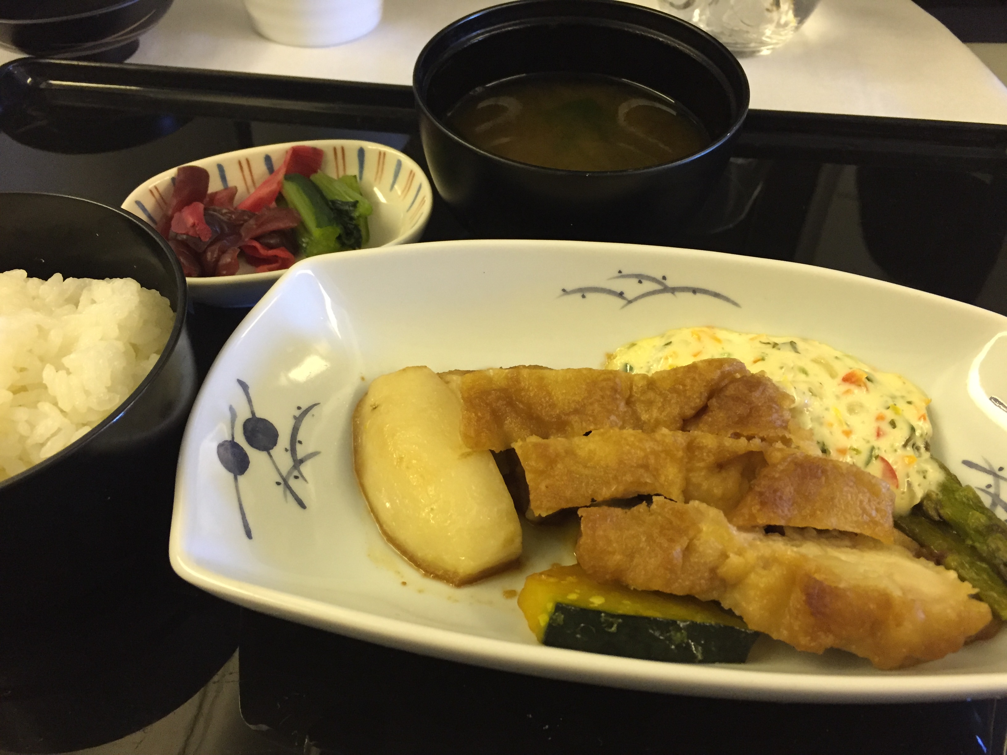 Steamed rice, miso soup, pickles, and deep-fried chicken with vinegar and tartar sauce