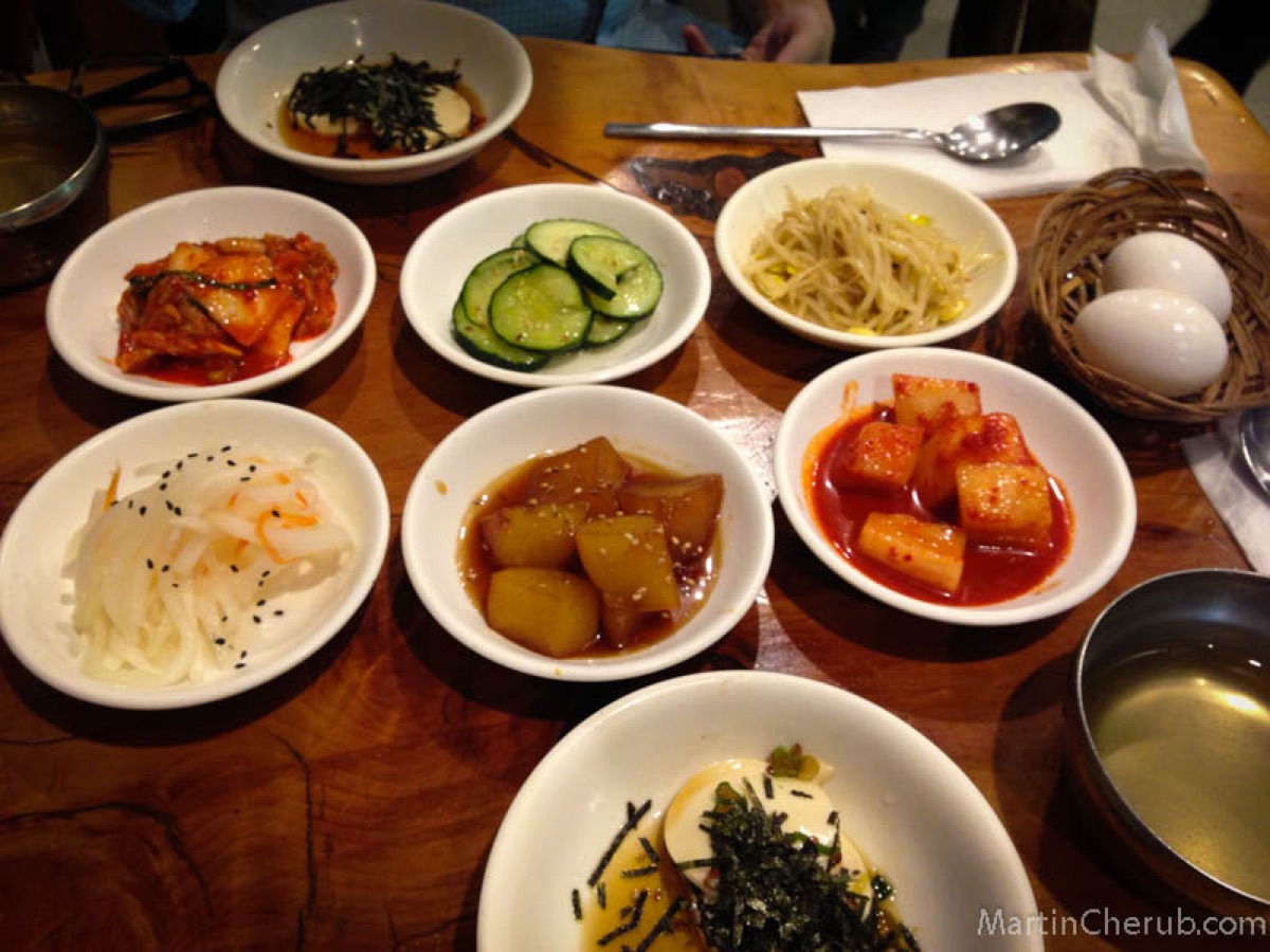 Banchan spread — the kimchi and potatoes were standouts