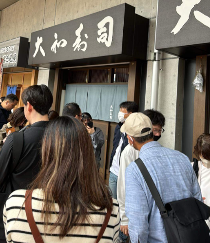 The queue outside Daiwa Sushi